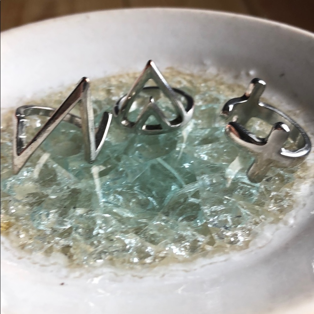 Silver rings with abstract designs